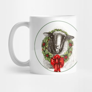 Sheep wearing a holly wreath with red bow Mug